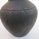 Black African pottery with stylized giraffe pattern