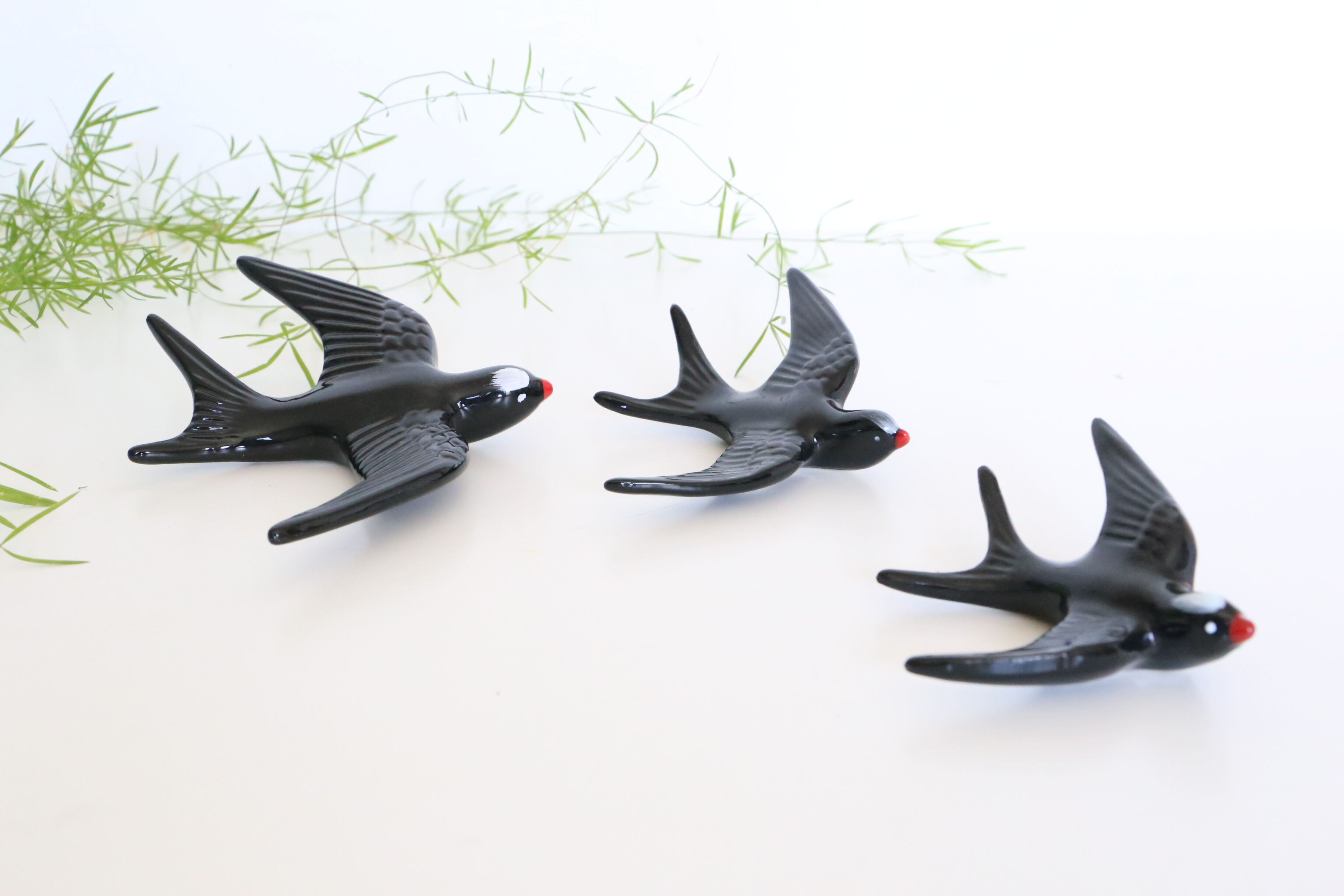 Soaring 3 ceramic swallows