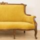 Art Nouveau walnut and mustard velvet sofa