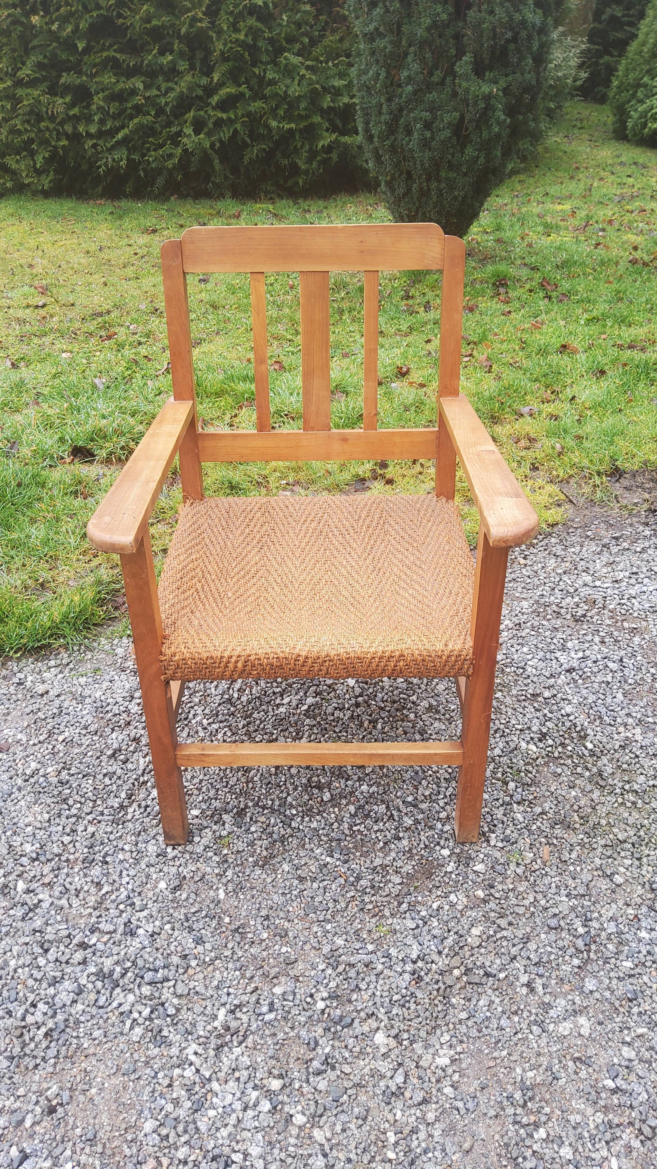Scandinavian armchair of the 50s in cherry tree sitting in rope