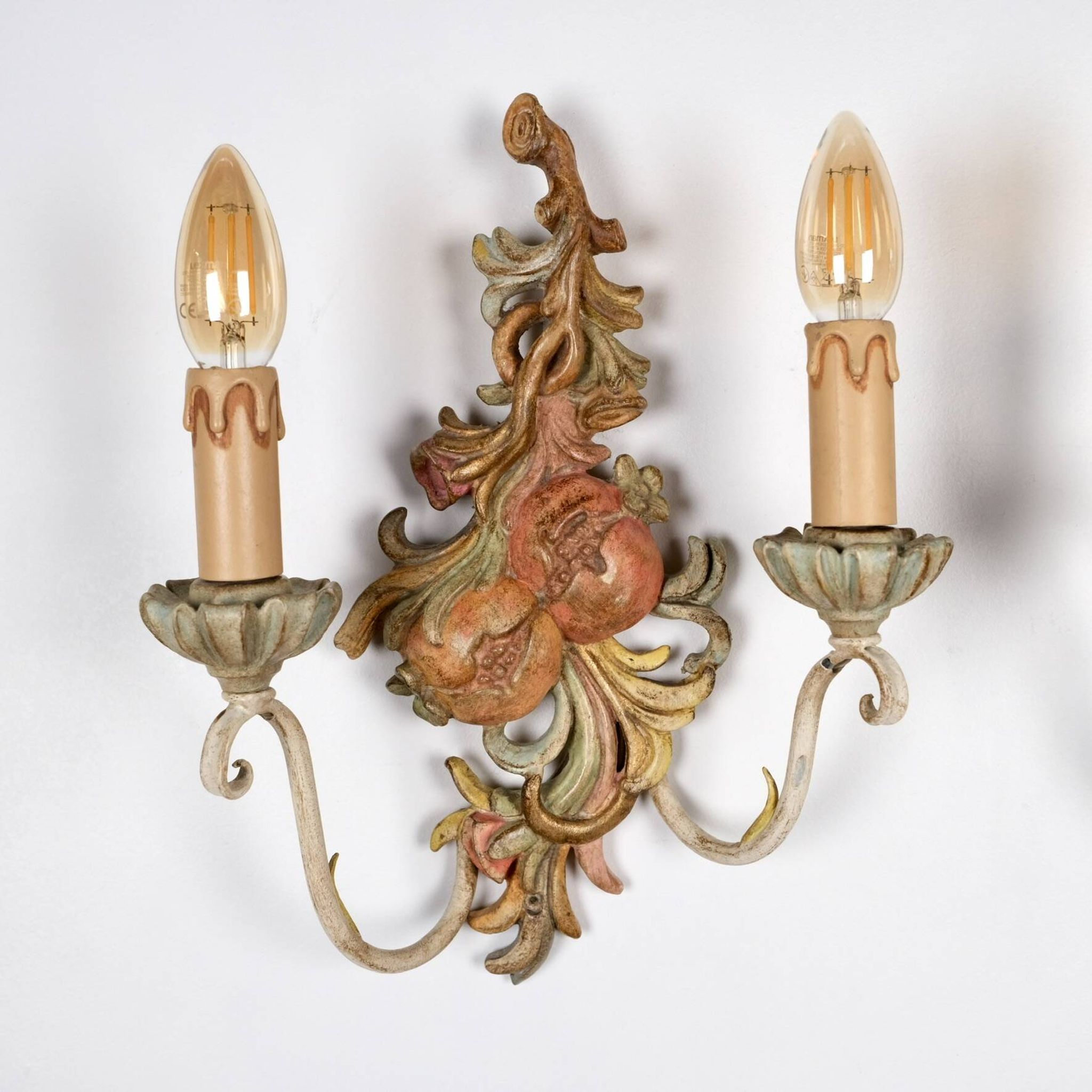 Pair of carved wood and metal sconces, Chelini FIrenze, Italy