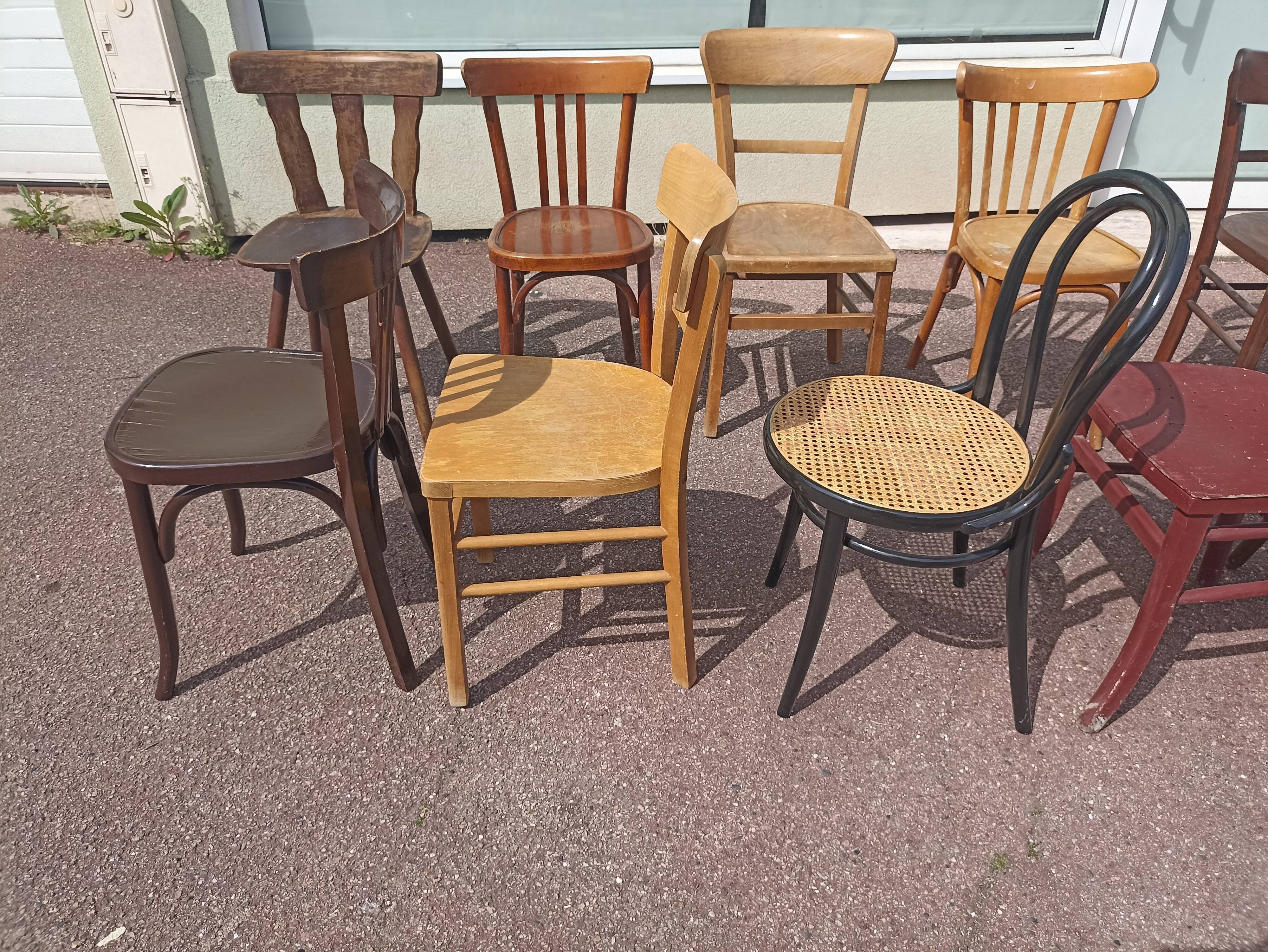 Set of 12 mismatched wooden bistro chairs