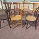 Set of 12 mismatched wooden bistro chairs
