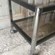 Metal coffee table with smoked glass.