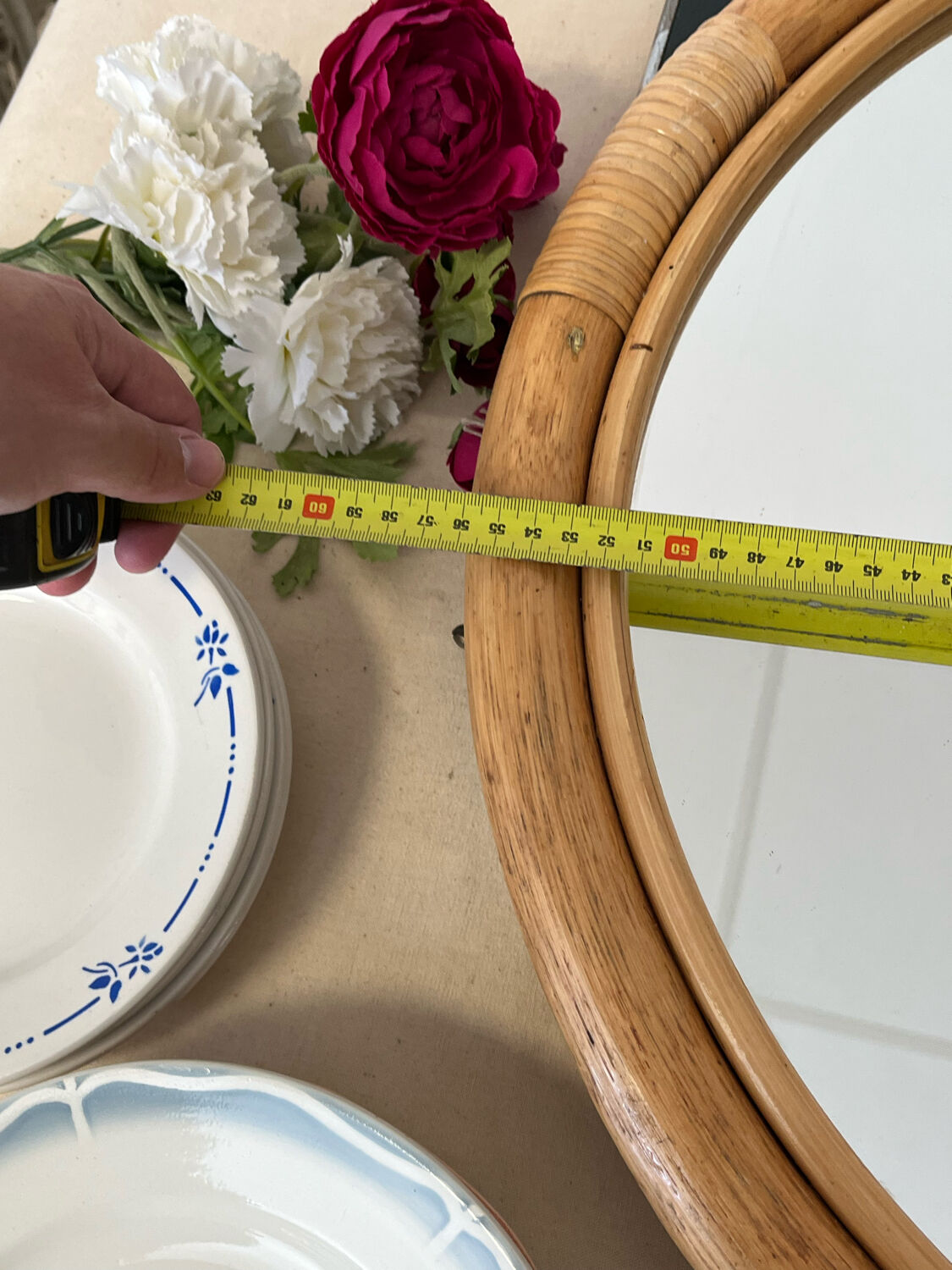 Round rattan mirror