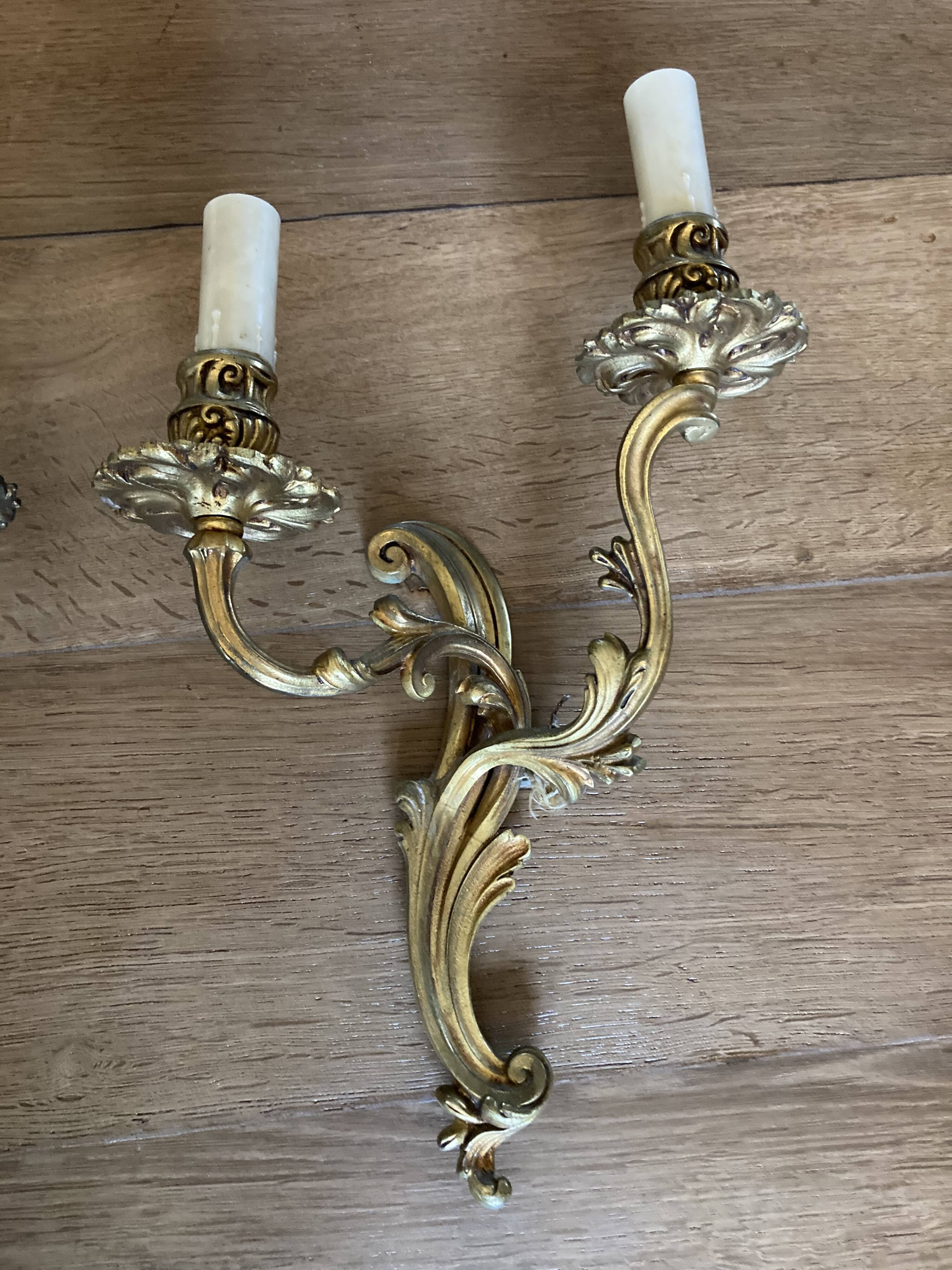 Pair of bronze wall lamps