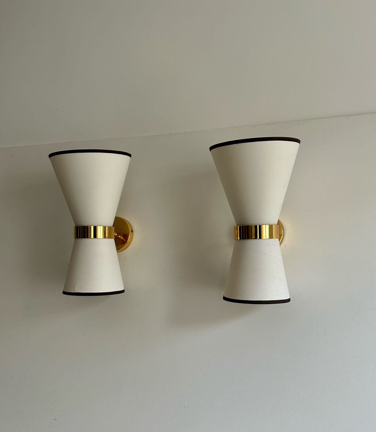 Pair of vintage wall lamps, brass and unbleached fabric, Italy 1980