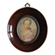 Miniature portrait of a young girl, framed and under glass