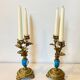 19th century candle holders in gilded bronze and porcelain