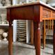 Desk, dark wood and marble side table