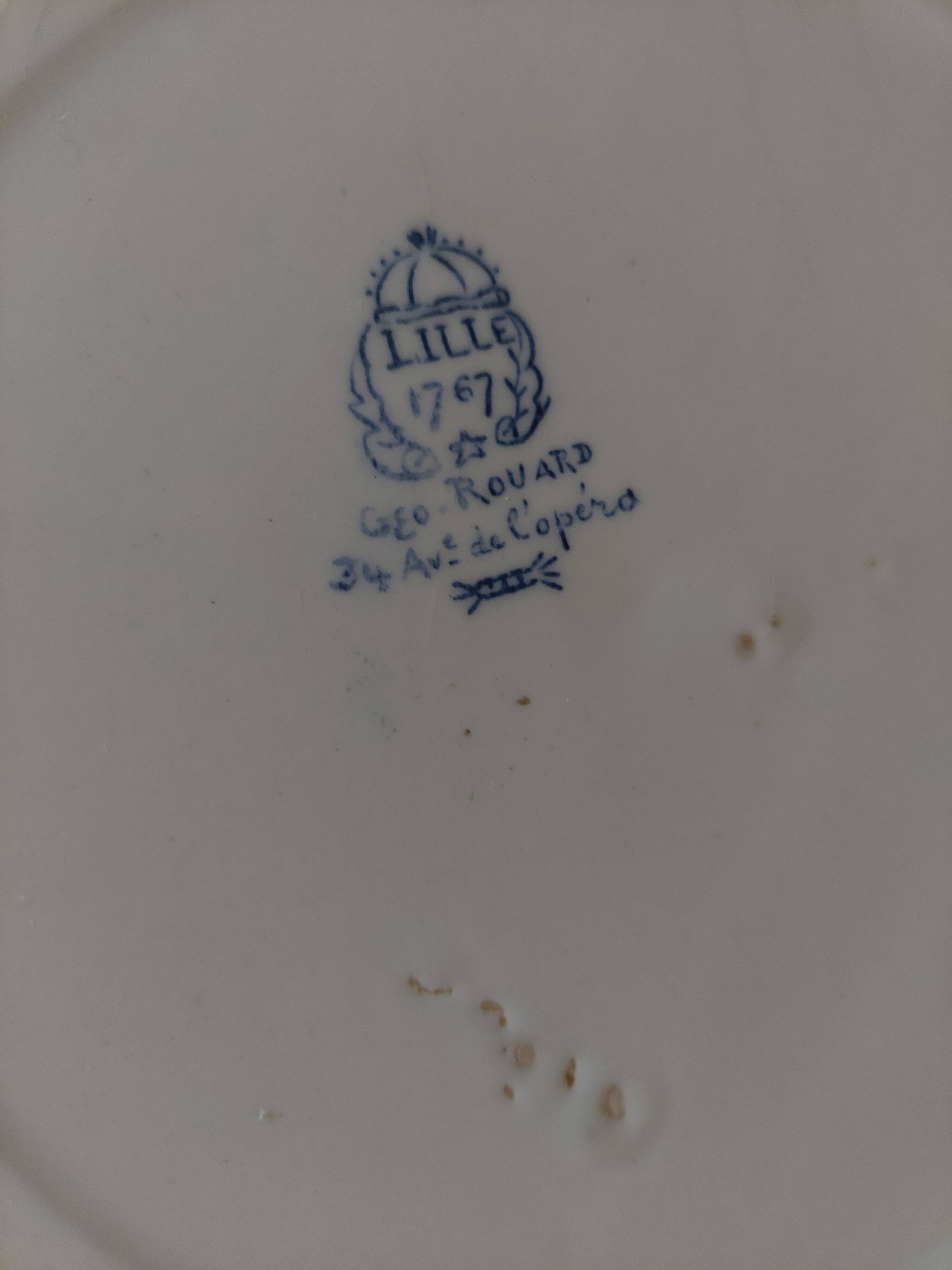 Set of eight flat plates, ironstone, Géon Rouard, Lille decoration, years.