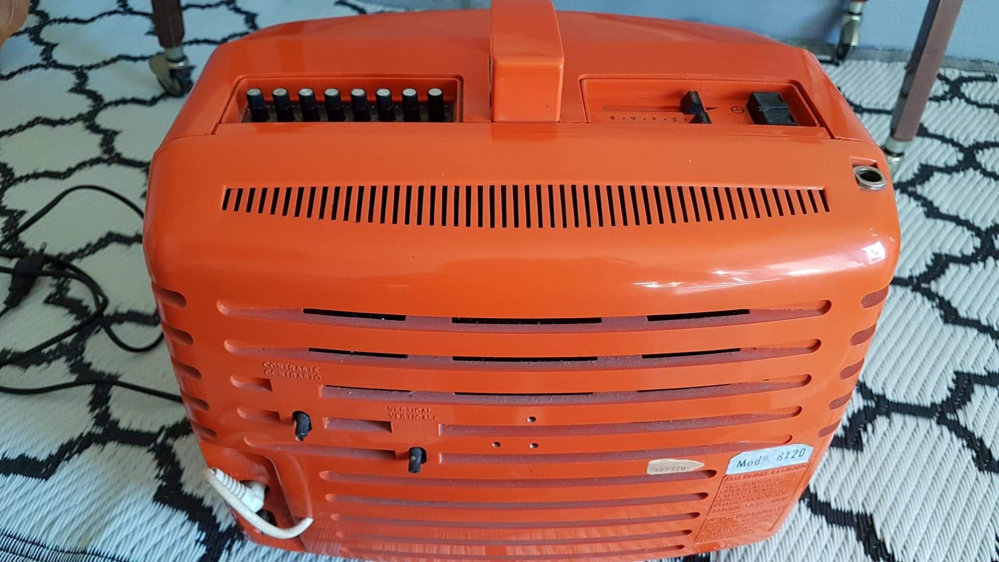 Vintage orange Prince portable TV