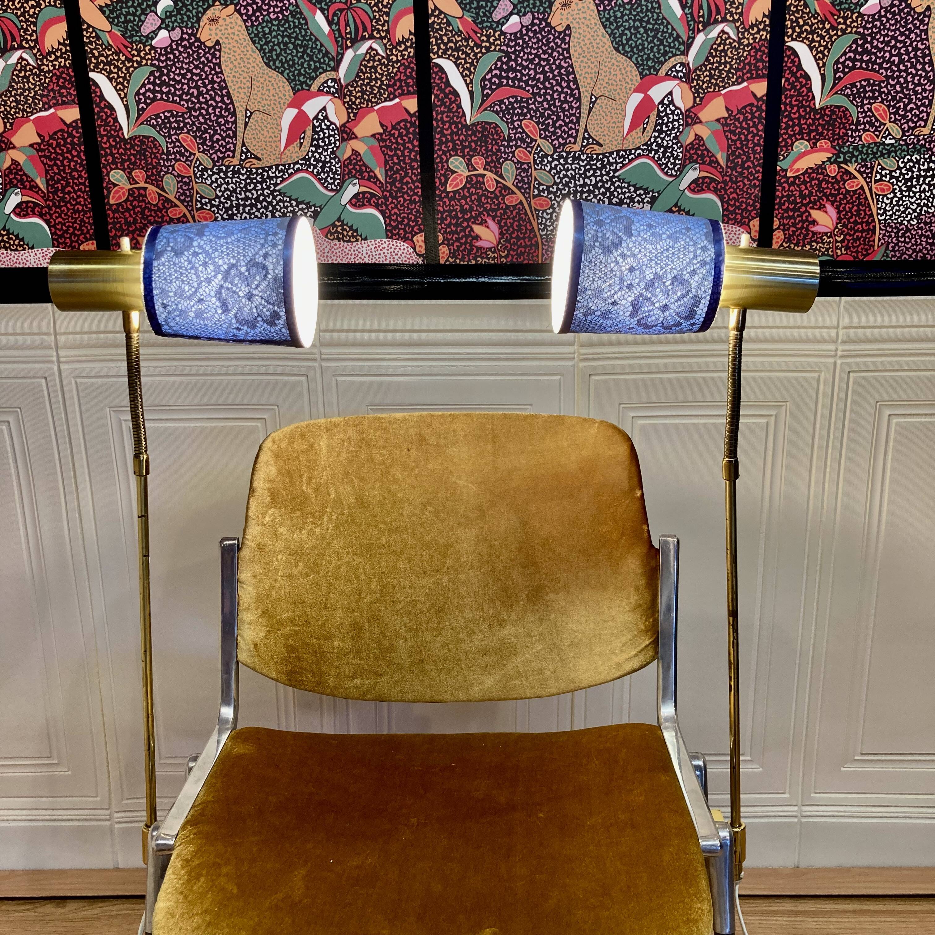 Pair of large modular industrial lamps from the 1950s.