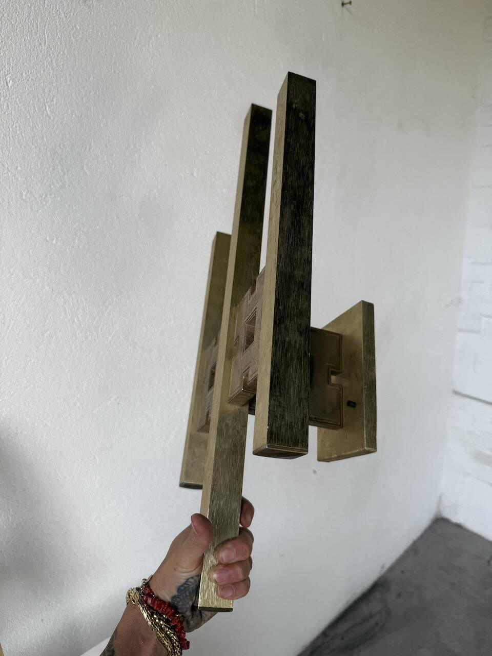 Pair of Regency brass wall lights in Italy