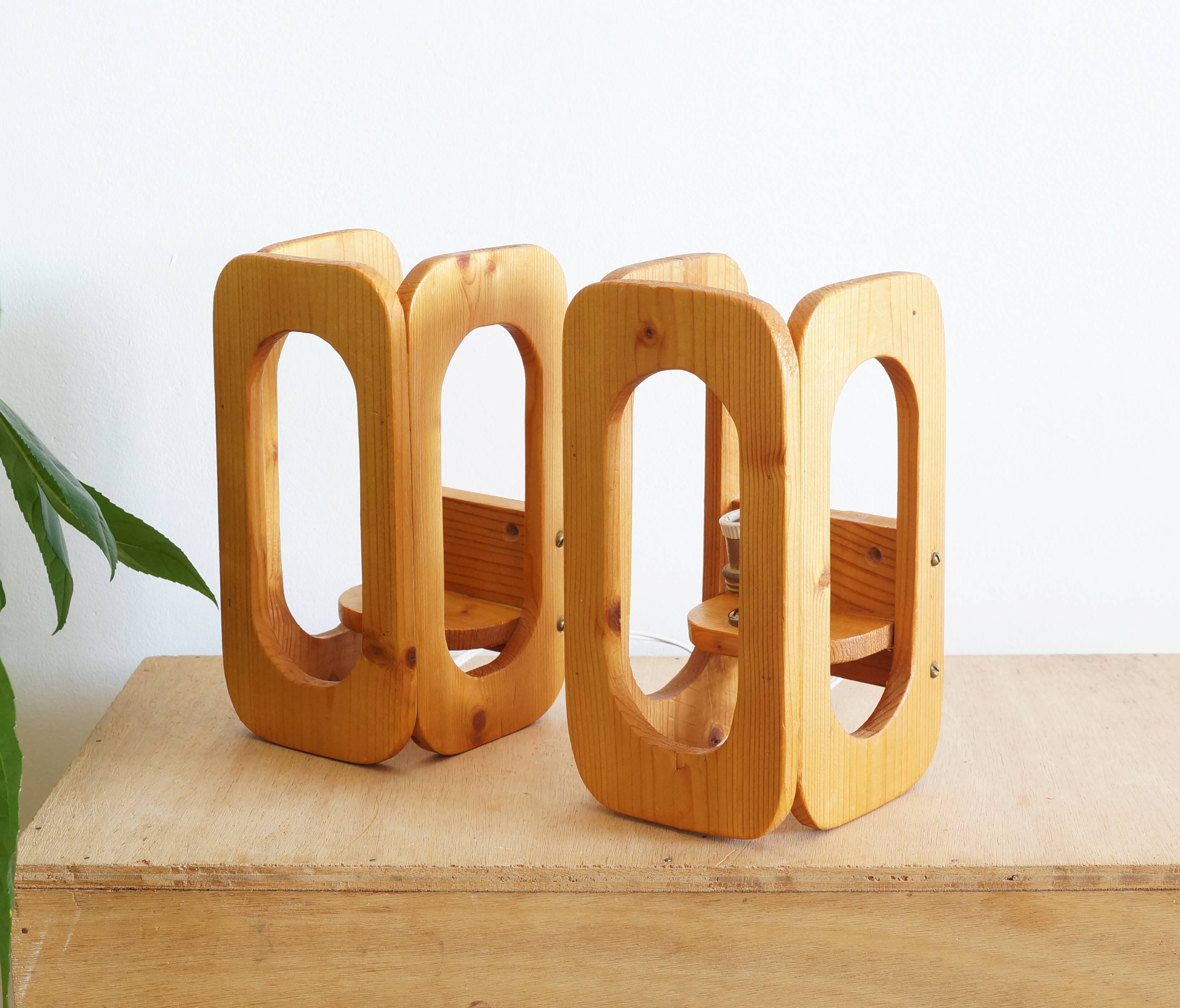 Two Scandinavian pine wall lamps in the 70s