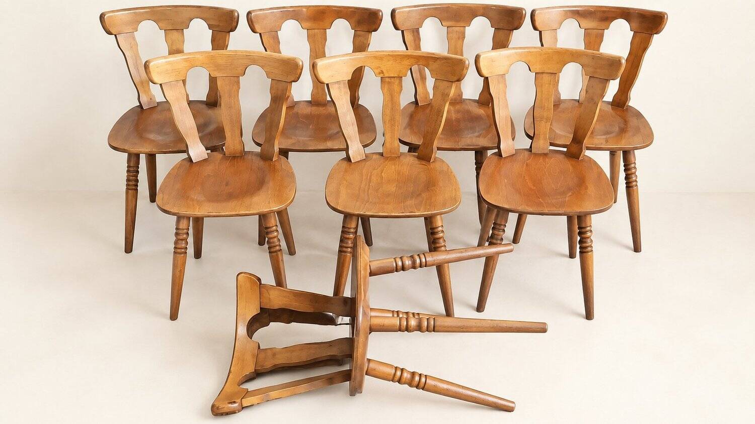 Set of 8 rustic bistro chairs in beech wood with honey patina, 1950s.