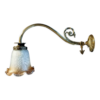 Brass wall lamp with speckled glass tulip