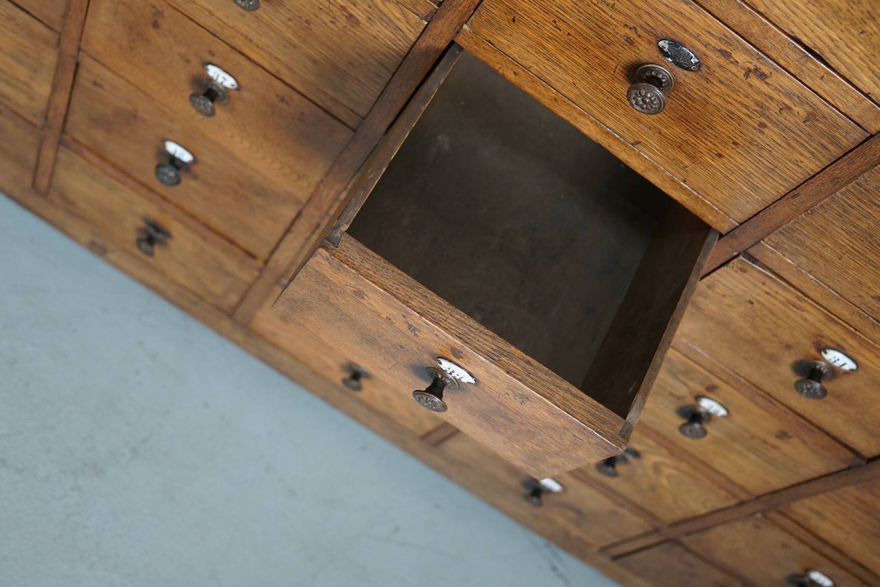 Large dutch oak apothecary cabinet / barber cabinet with enamel shields, 1900s