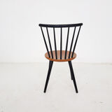 Vintage spindle back chair with round seating