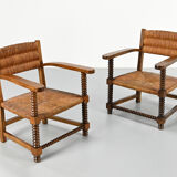 Pair of French armchairs with twisted legs in the style of Charles Dudouyt, France, 1940s.