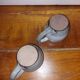 Two glazed stoneware mugs