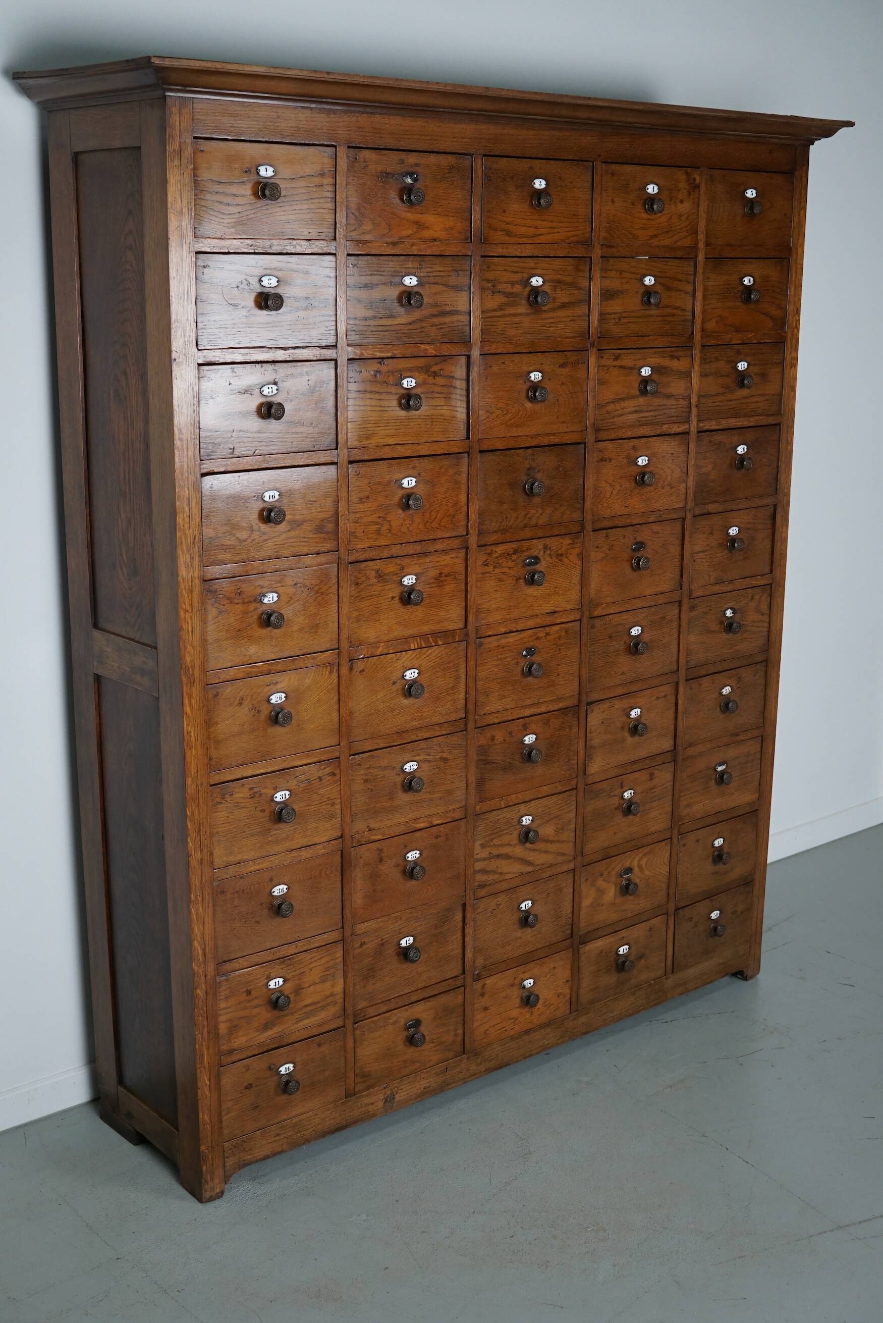 Large dutch oak apothecary cabinet / barber cabinet with enamel shields, 1900s