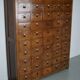 Large dutch oak apothecary cabinet / barber cabinet with enamel shields, 1900s