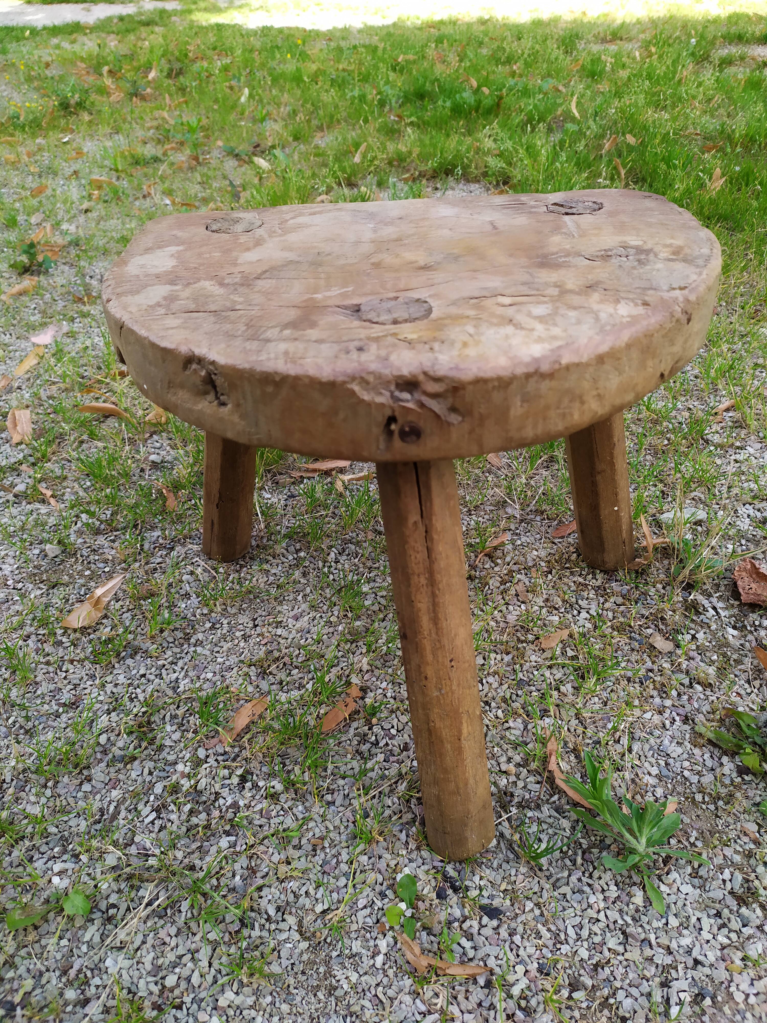 Tripod stool in raw wood