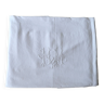 Old white hand-embroidered and monogrammed sheet