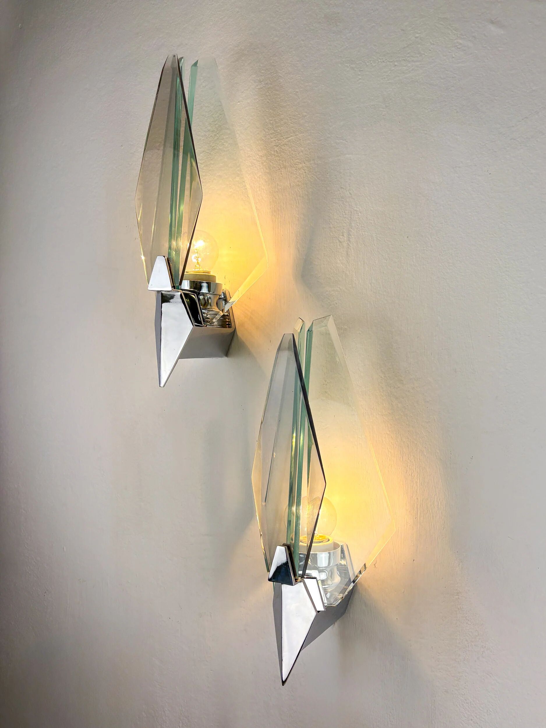 Pair of Veca sconces, Murano blue cut glass & black lucite, Italy, circa 1970s