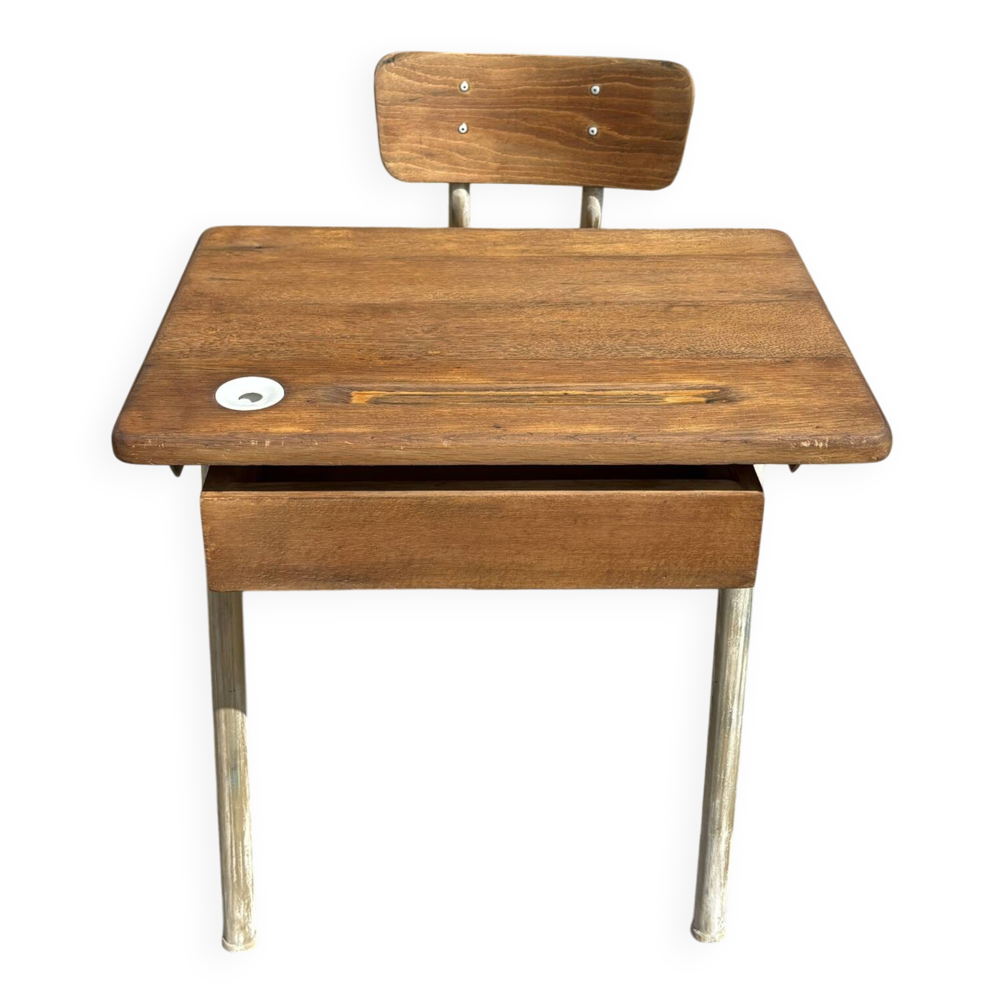 Renovated antique desk with inkwell.