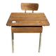 Renovated antique desk with inkwell.