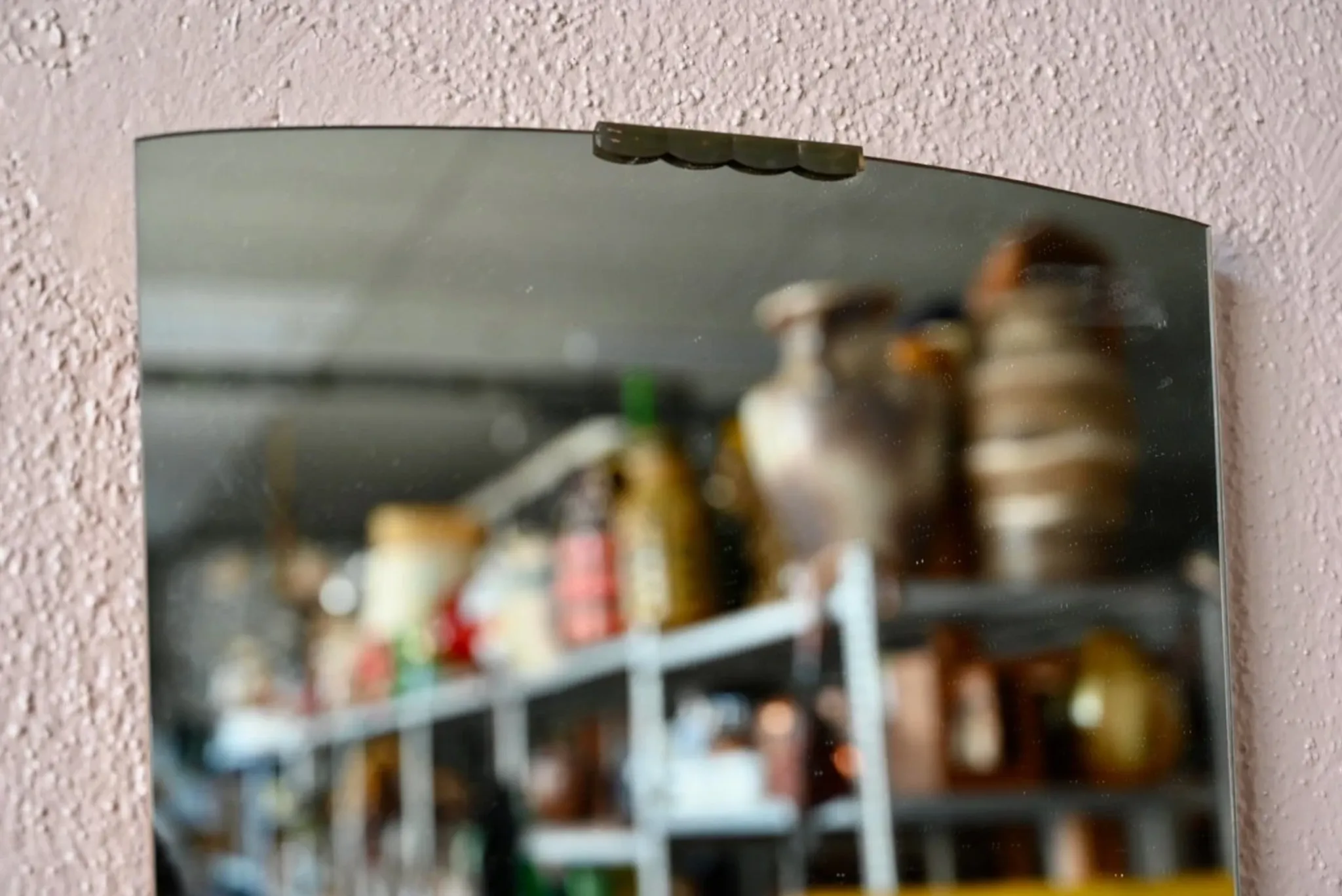 Vintage mirror rearview design from the 60s, patinated brass.