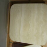 Low tables in travertine