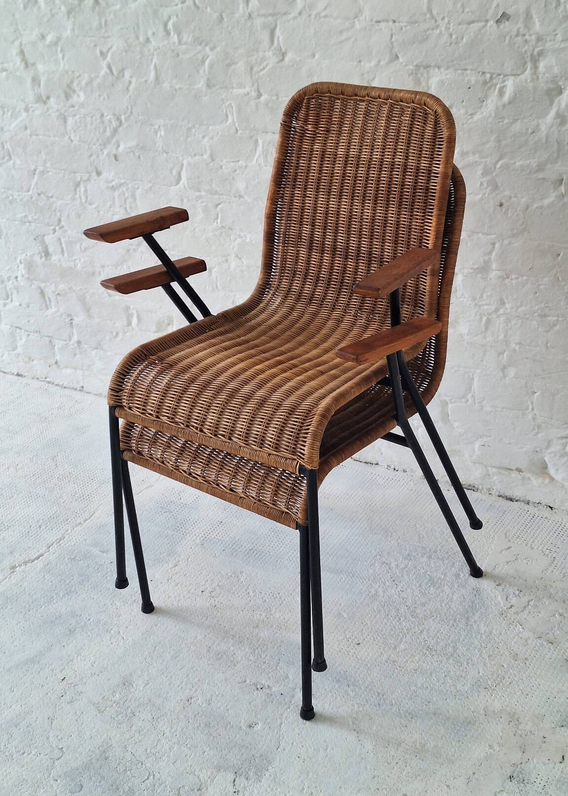 Pair of Swiss stackable rattan and iron dining elbow chairs, G Legler 1960s