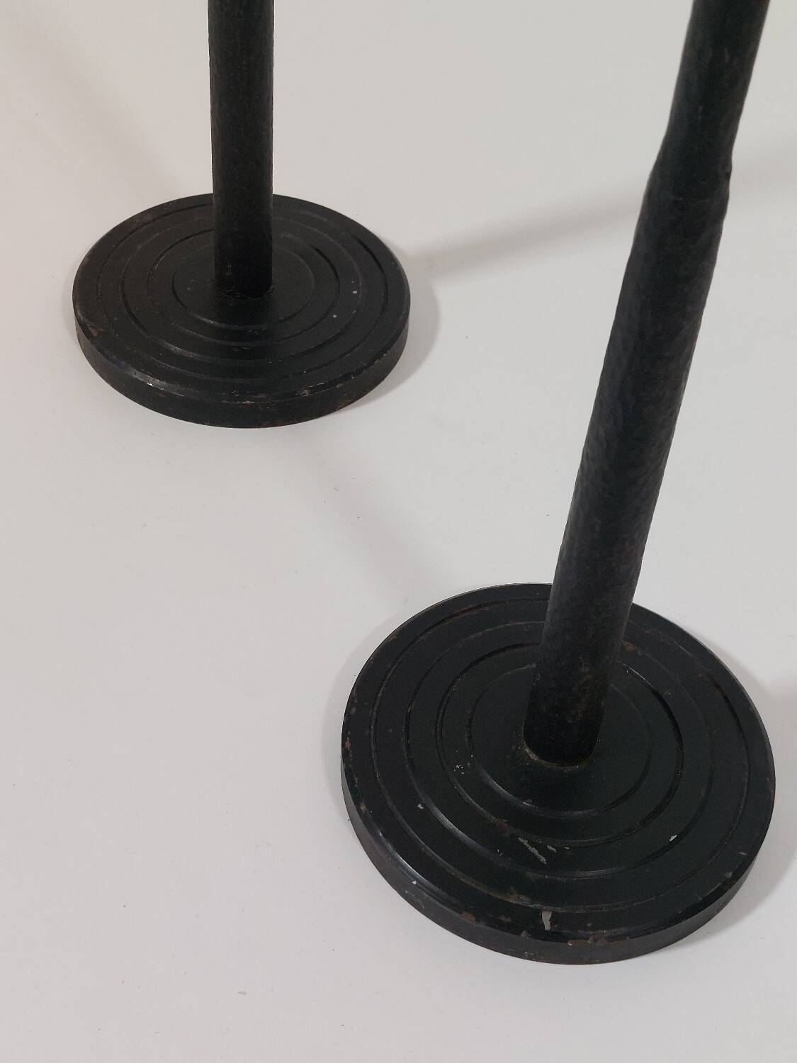 A pair of beautiful and exquisite vintage wrought iron candlesticks from the mid-century.