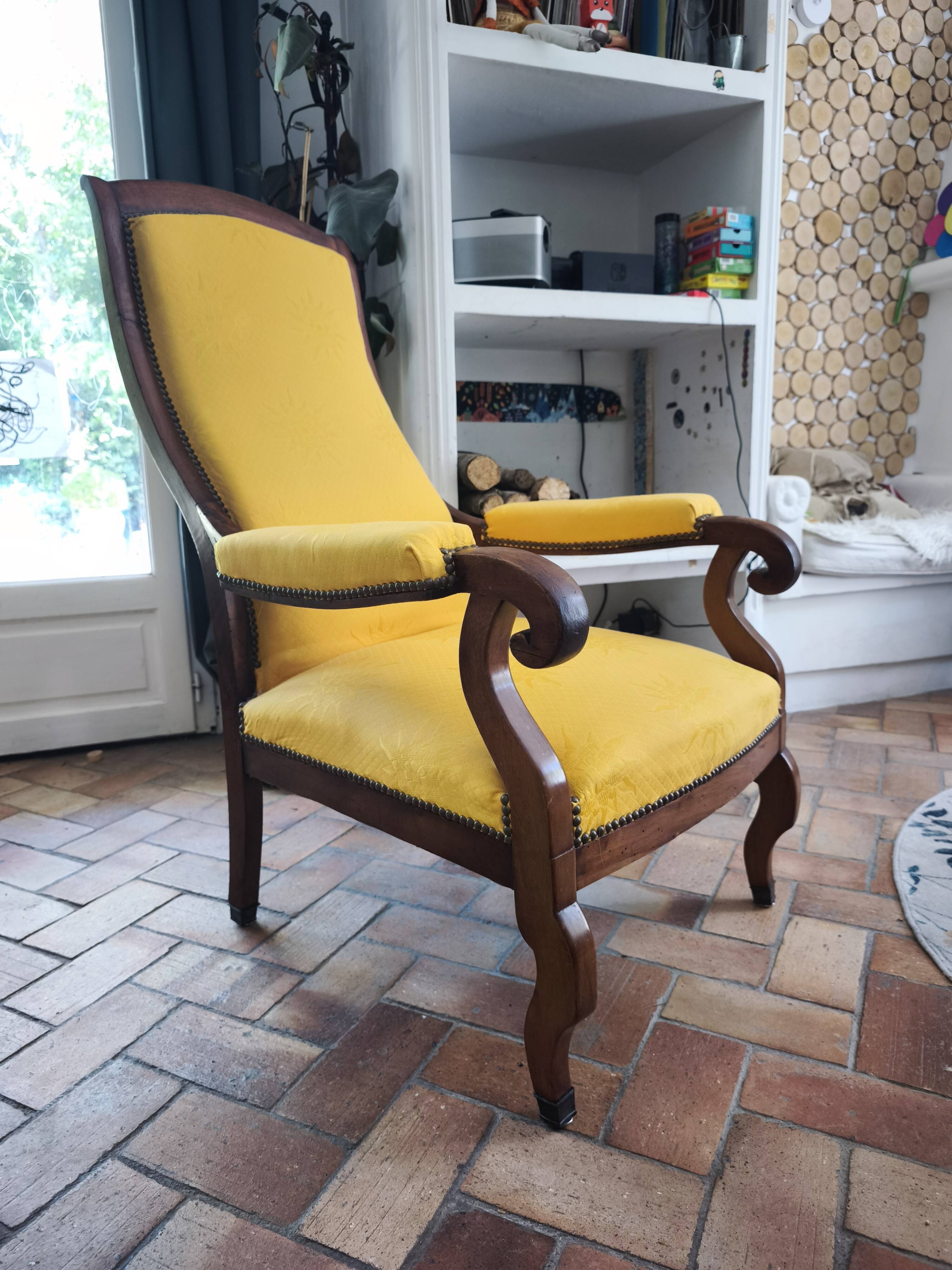 Yellow Voltaire armchair
