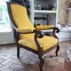 Yellow Voltaire armchair