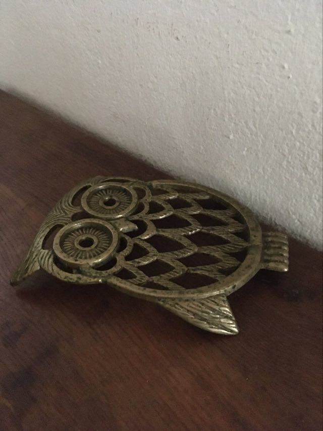 Under the nice brass dish.