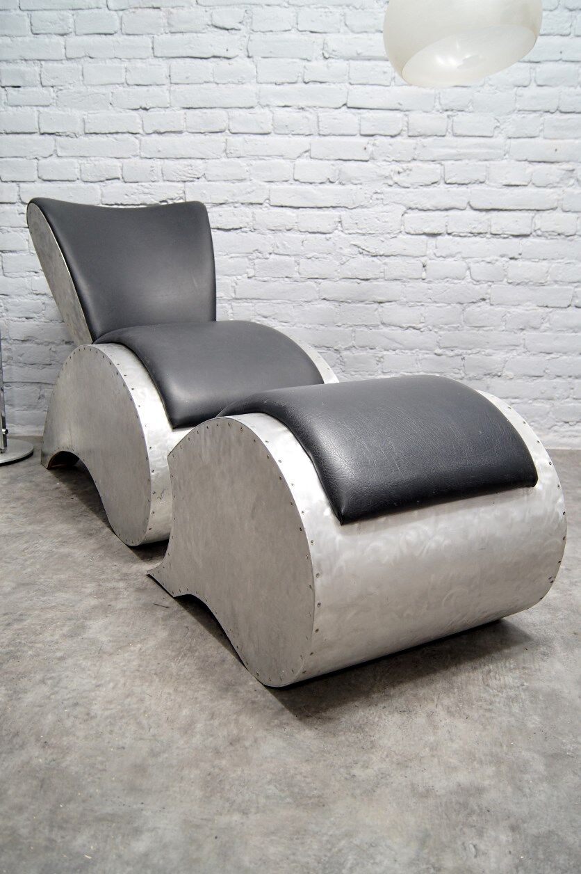 Industrial aluminum & vinyl lounge chair with footrest, 1970s