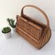 Basket in woven rattan from the 60's