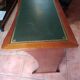 Wall-mounted writing table in cherry wood. retractable.