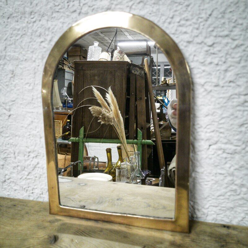 Brass half-moon mirror