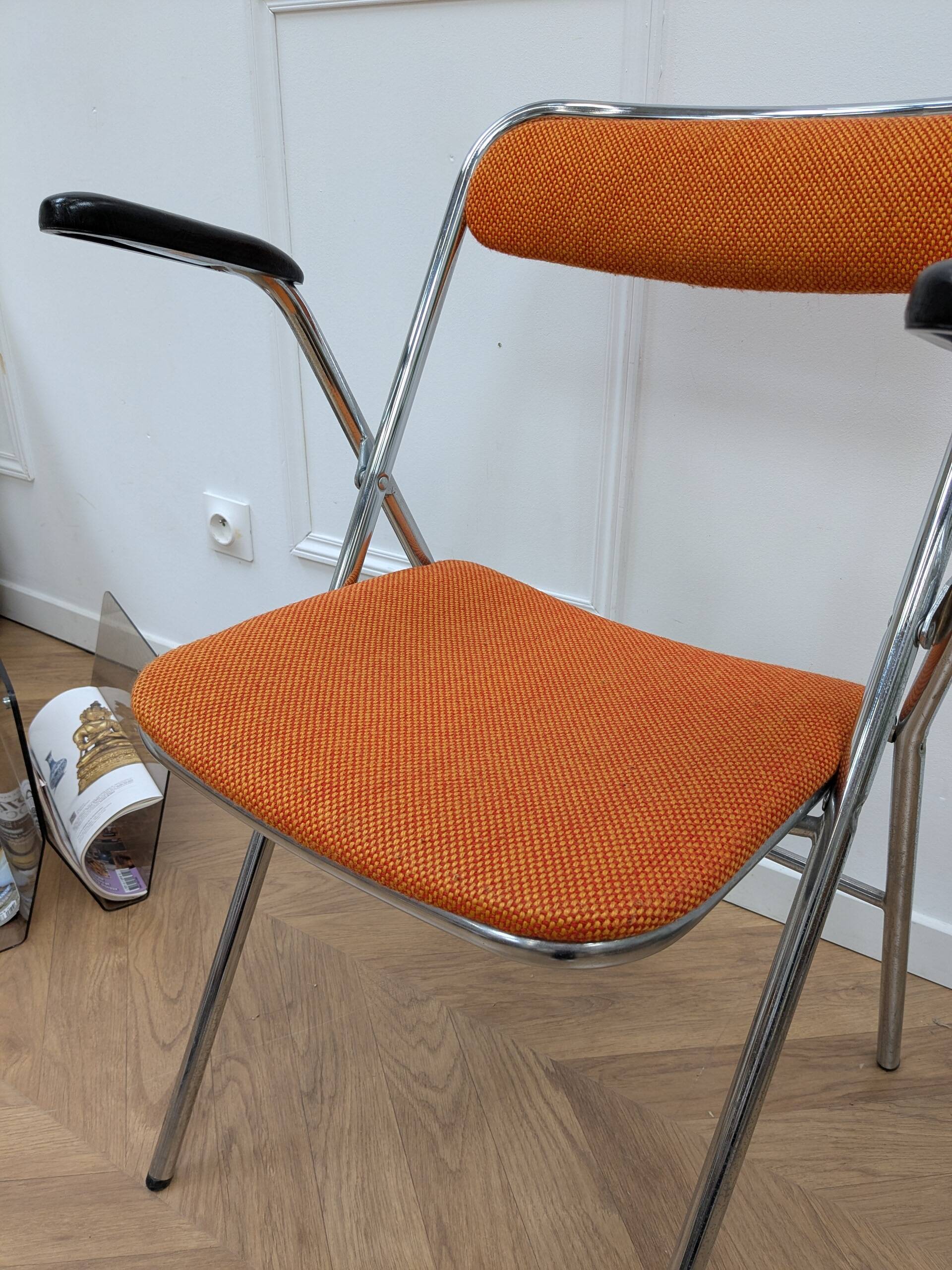 Orange folding chair