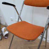 Orange folding chair
