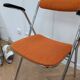 Chaise orange pliable