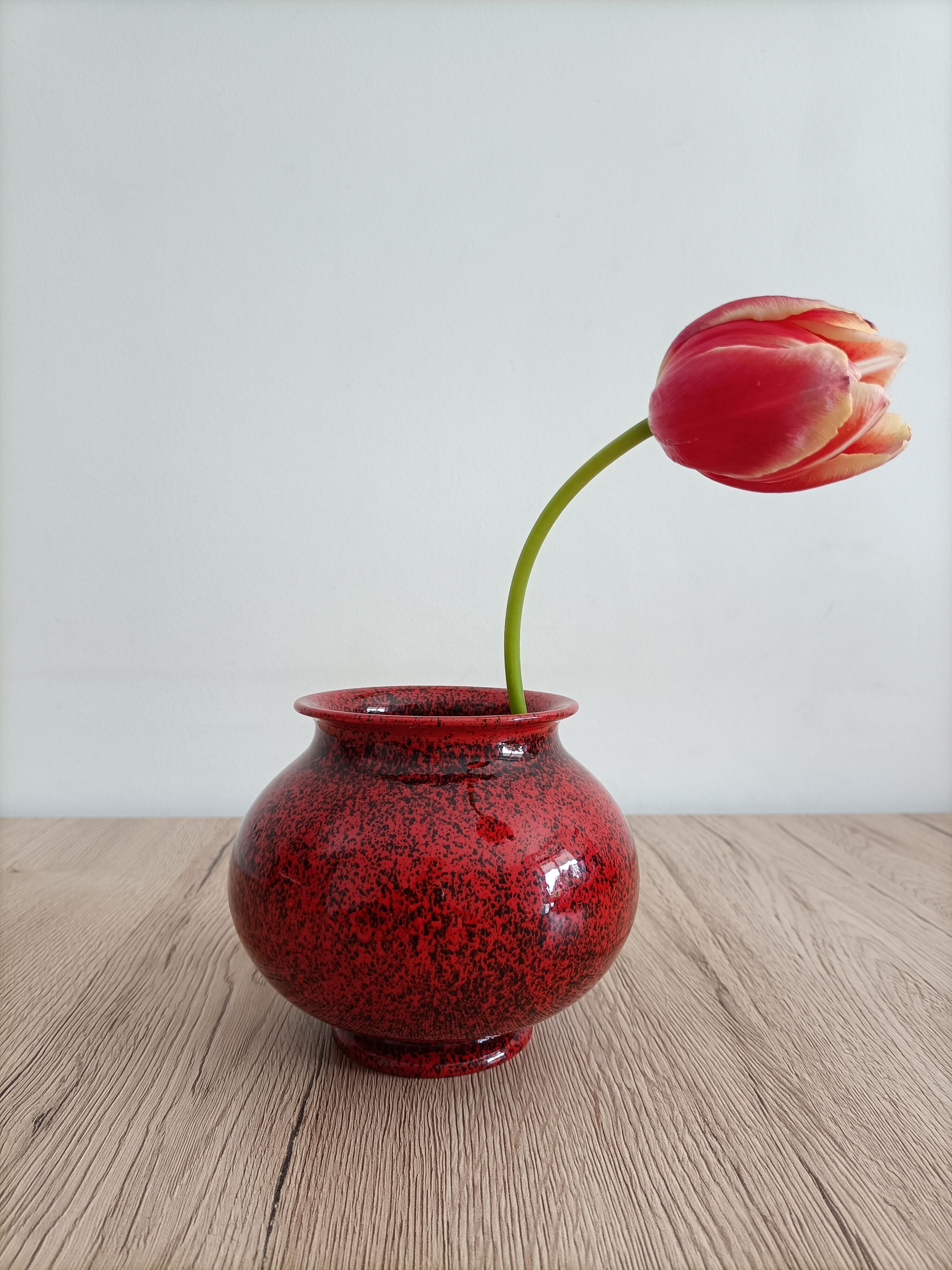 Red and black ceramic vase or pot cover