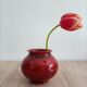 Red and black ceramic vase or pot cover