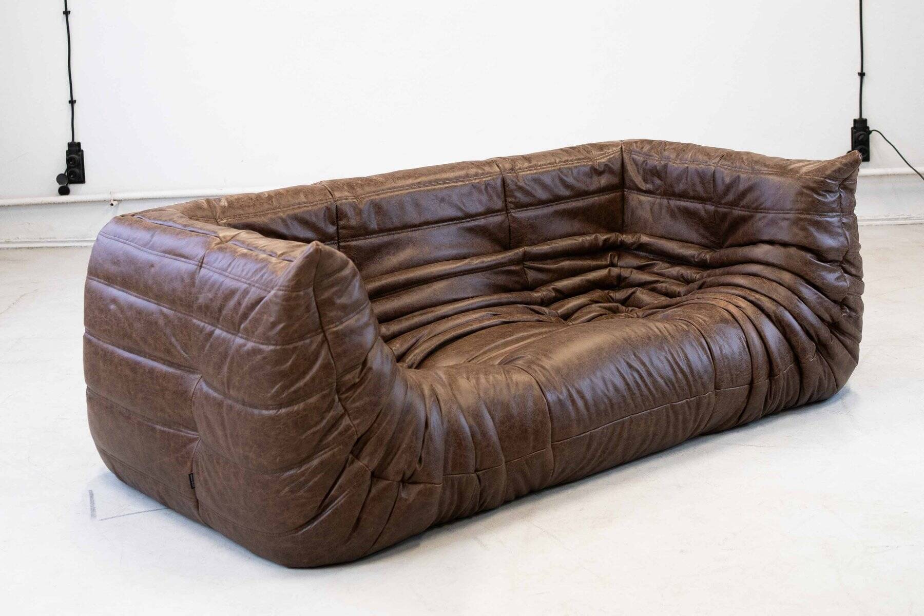 Vintage two-seater Togo sofa with arms in brown leather by Michel Ducaroy for Ligne Roset, 1970s