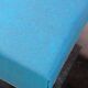 Repose-pieds bois et tissu bleu